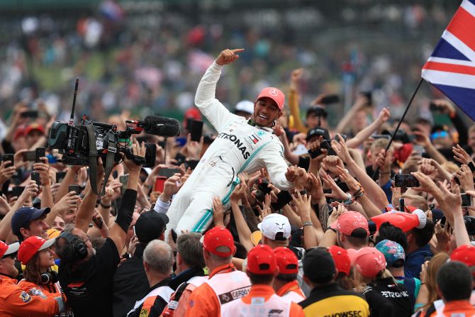 Lewis Hamilton celebrates after winning the British Grand Prix on Sunday, July 14.