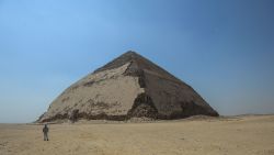 TOPSHOT - A picture taken on July 13, 2019 shows the Bent pyramid of King Sneferu, the first pharaoh of Egypt's 4th dynasty, in the ancient royal necropolis of Dahshur on the west bank of the Nile River, south of the capital Cairo. - An Egyptian archaeological mission discovered a collection of stone, clay and wooden sarcophagi, of which some are still containing well preserved mummies, as well as a collection of wooden funerary masks and instruments used in cutting stones. Mohamed el-Shahed/AFP/Getty Images