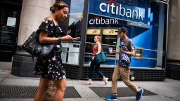 Pedestrians pass a Citigroup Inc. bank branch in New York, U.S., on Wednesday, July 3, 2019. Citigroup Inc. is scheduled to release earnings figures on July 15. Photographer: Mark Kauzlarich/Bloomberg via Getty Images