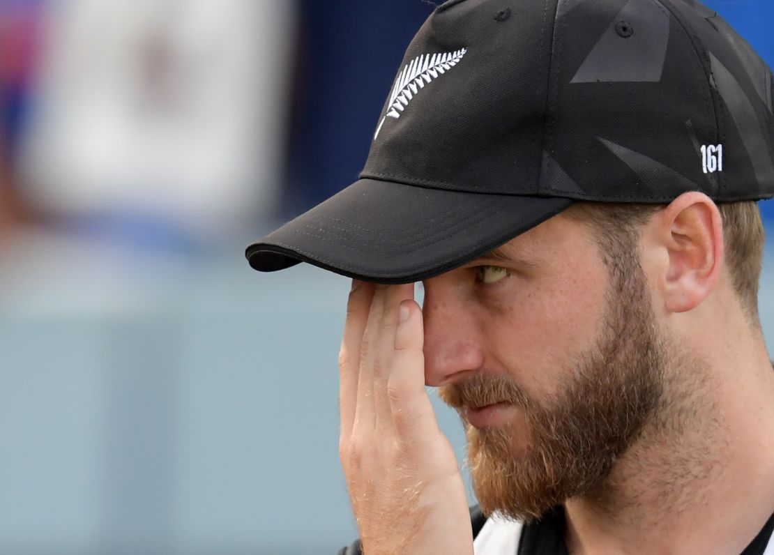 New Zealand's captain Kane Williamson looks on at the trophy presentation after defeat.