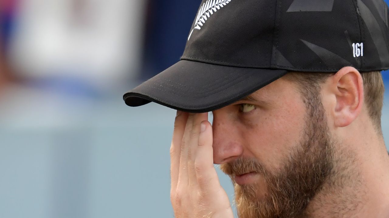 New Zealand's captain Kane Williamson looks on at the trophy presentation after defeat.