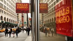 NEW YORK, NY - OCTOBER 13:  People walk by a Wells Fargo bank branch on October 13, 2017 in New York City. Wells Fargo shares were down 3.4% toÊ$53.34Êin afternoonÊtrading following news that the banks quarterly profit from July through September dropped nearly 19%.  (Photo by Spencer Platt/Getty Images)