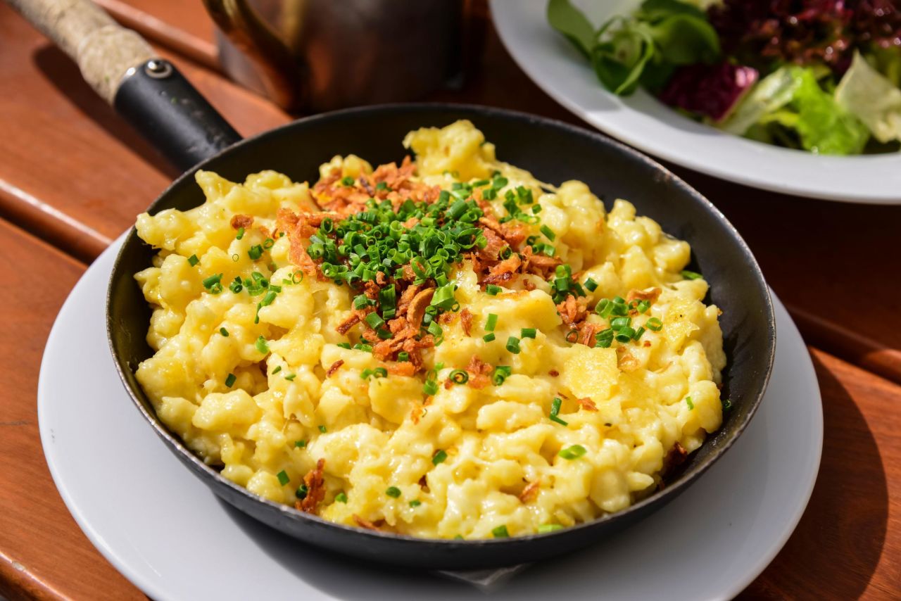 <strong>Käsespätzle: </strong>This cheesy pasta dish is popular in cozy Munich pubs in winter. 