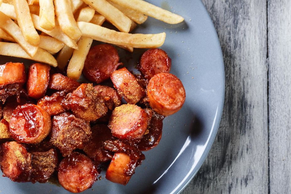 <strong>Currywurst:</strong> Ketchup mixed with curry powder made this sausage a street food classic. 
