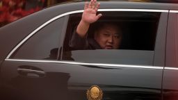 Kim Jong Un waves from his car upon his arrival in Vietnam on February 26 to attend the second US-North Korea summit.