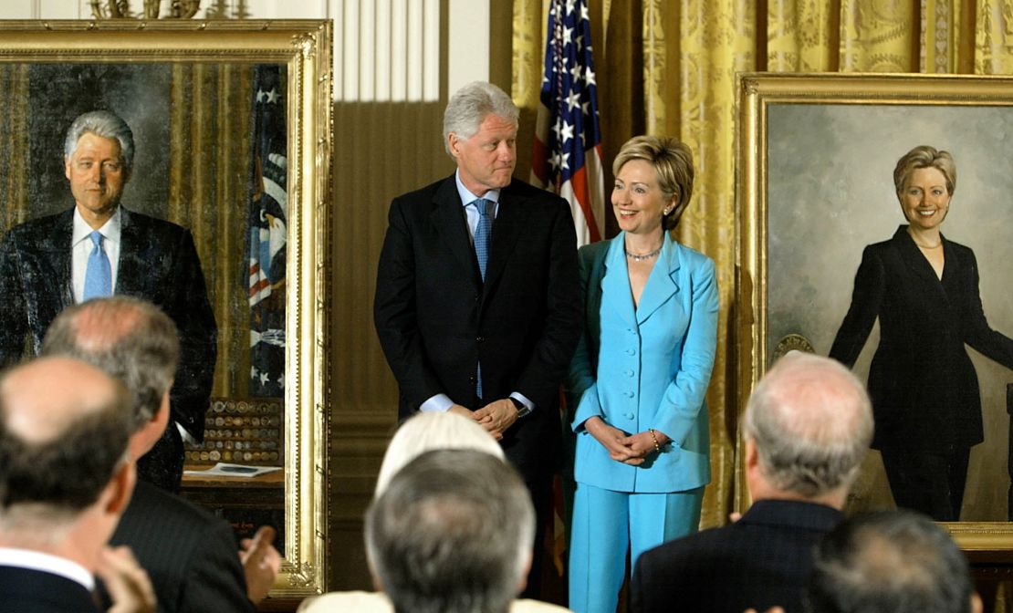 The Clintons portraits are unveiled in the East Room of the White House in June 2004.