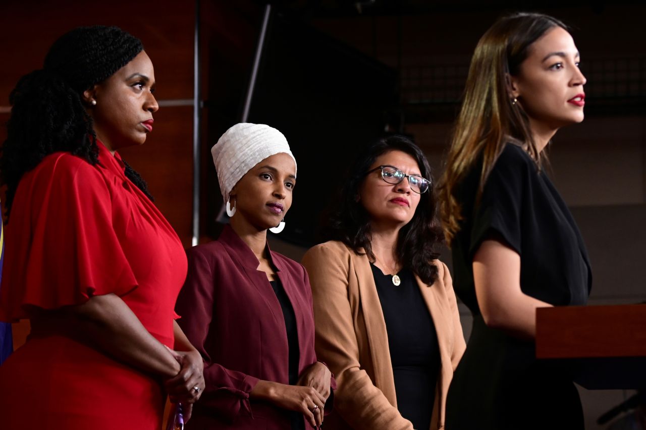 From left, US Reps. Ayanna Pressley of Massachusetts, Ilhan Omar of Minnesota, Rashida Tlaib of Michigan and Alexandria Ocasio-Cortez of New York hold a news conference in Washington on Monday, the day after President Donald Trump tweeted that these four lawmakers should "go back and help fix the totally broken and crime infested places from which they came." Trump stood by those remarks on Monday, denying they were racially motivated. Three of the four congresswomen in question were born in the US and all four are US citizens.
