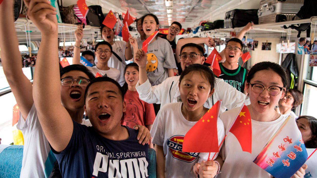 Students board a "gaokao train" at Dayangshu township on June 5 in the Inner Mongolia Autonomous Region, China.