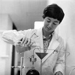 One of the experiments at Ames in 1969 included biologist Caye Johnson preparing a vitamin mixture for Petri dishes with lunar samples.