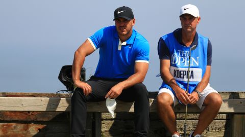 Brooks Koepka and caddie Ricky Elliott, a Portrush native, ahead of the Open Championship. 