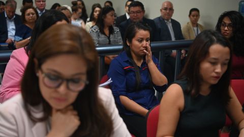 Evelyn Hernandez (center) appears before Ciudad Delgados court, San Salvador, on July 15, 2019. 