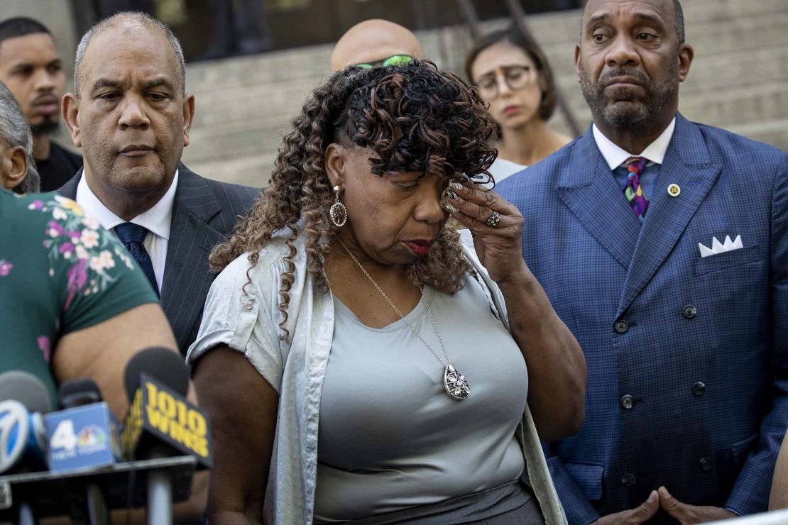 Eric Garner's mother Gwen Carr wiped away tears after speaking to reporters outside the US Attorney's office on Tuesday.