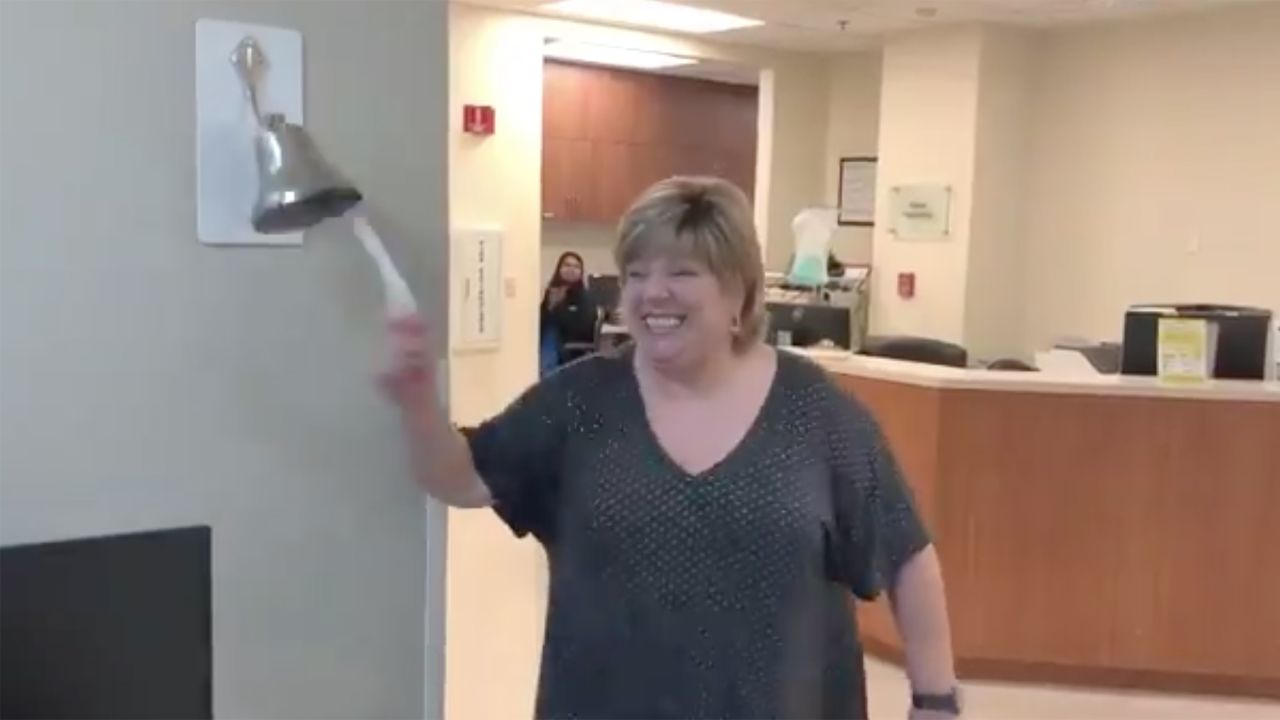 Darla Jaye was first diagnosed with breast cancer in February, and broke this bell on her last day of treatment. 