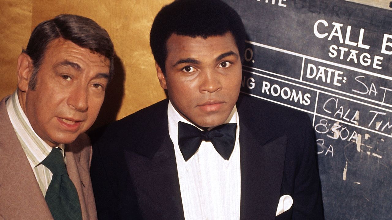 Muhammad Ali is photographed with Howard Cosell backstage before "The Muhammad Ali Variety Special" in July of 1975.