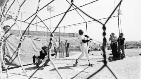 Frank Robinson takes a few swings during batting practice in this undated photo. He was the first African American to manage a team in the major league. 