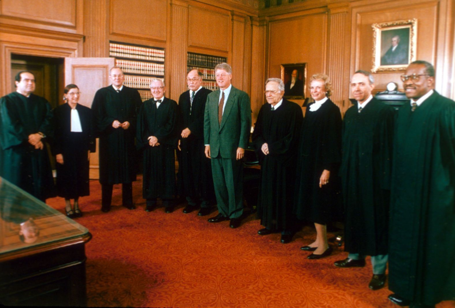 President Bill Clinton poses with members of the Supreme Court in Washington on October 1, 1993. From left are Antonin Scalia, Ruth Bader Ginsburg, Anthony Kennedy, Stevens, Chief Justice William Rehnquist, Clinton, Harry Blackmun, Sandra Day O'Connor, David Souter and Clarence Thomas.