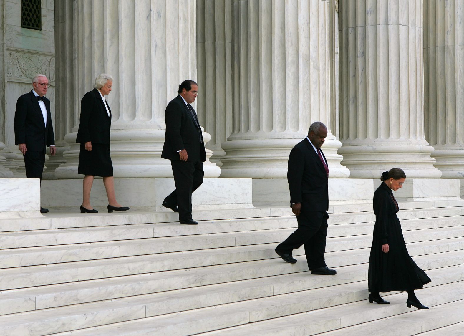 Stevens joins fellow justices on the steps of the Supreme Court on September 6, 2005, during ceremonies honoring Chief Justice William Rehnquist after his death. From left are Stevens, Sandra Day O'Connor, Antonin Scalia, Clarence Thomas and Ruth Bader Ginsburg. 