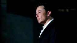 CHICAGO, IL - JUNE 14: Engineer and tech entrepreneur Elon Musk of The Boring Company  listens as Chicago Mayor Rahm Emanuel talks about constructing a high speed transit tunnel at Block 37 during a news conference on June 14, 2018 in Chicago, Illinois. Musk said he could create a 16-passenger vehicle to operate on a high-speed rail system that could get travelers to and from downtown Chicago and O'hare International Airport under twenty minutes, at speeds of over 100 miles per hour. (Photo by Joshua Lott/Getty Images)