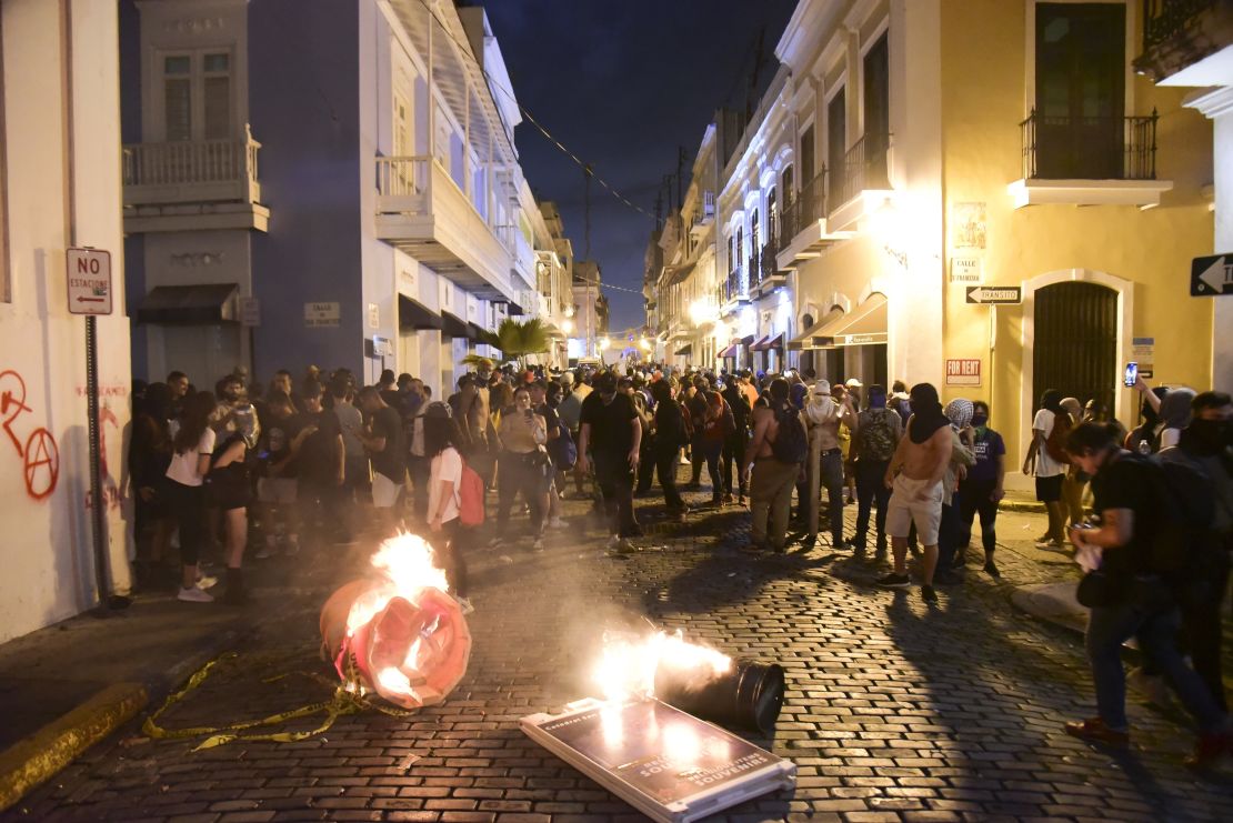 Protesters filling the street in front of the governor's mansion in Old San Juan clashed with police.