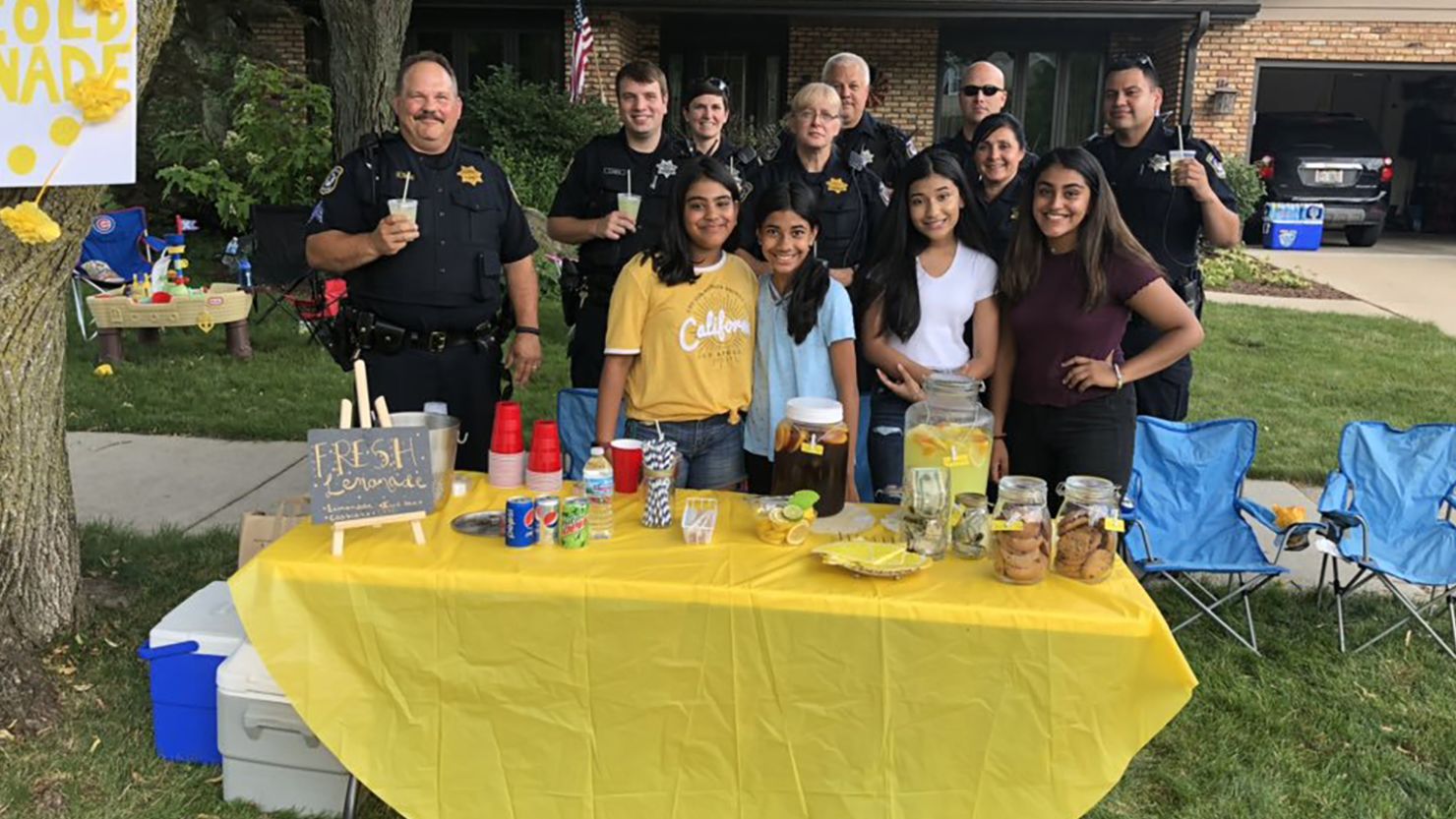 Alizay Kashif, in yellow, and her friends saw an outpouring of support for their lemonade stand.