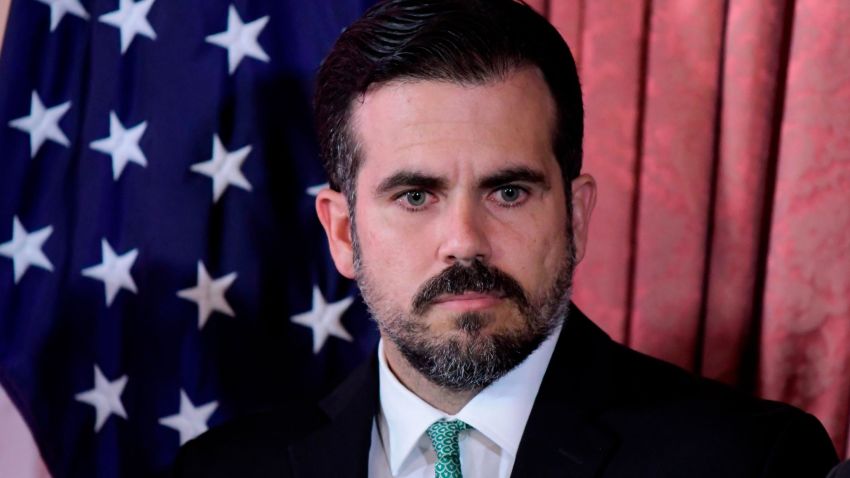 Puerto Rico Gov. Ricardo Rossello attends a press conference in La Fortaleza's Tea Room, in San Juan, Puerto Rico, Tuesday, July 16, 2019. Rossello summoned the press a few hours after a riot took place near the executive mansion, where protesters demanded Rossello step down after a leak of profanity-laced and at times misogynistic online chat with nine other male members of his administration. (AP Photo/Carlos Giusti)