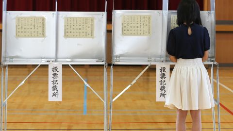 A woman casts her vote at a polling station in Japan. Sunday's upper house election could see a dramatic increase in the number of female lawmakers. 
