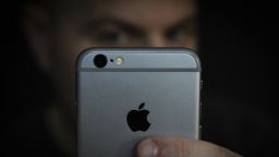 A man is seen using an iPhone on November 2, 2017. Concerns have been raised about Apple's new iPhone X and it's front facing camera with face recognition. Apple allows thrid party developers to store information from facial photographs on it's servers raising security concerns with privacy groups. (Photo by Jaap Arriens/NurPhoto via Getty Images)