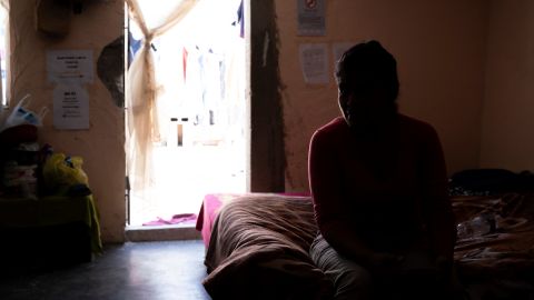 Yolanda, a migrant from El Salvador, rests atop her bunk inside of Iglesia Metodista "El Buen Pastor," after being released from US custody on June 14, 2019 in Ciudad Juarez.   (Photo by Paul Ratje / AFP)     