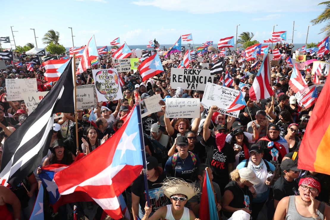 Demonstrators protest outside Puerto Rico's Capitol Building in Old San Juan on Wednesday.