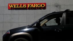 SAN RAFAEL, CA - APRIL 13:  A car sits parked in front of a Wells Fargo bank office on April 13, 2018 in San Rafael, California. Wells Fargo reported better than expected first quarter earnings with a profit of $5.94 billion but may need to update the results as investigations into the bank's auto loans and mortgages that could cost $1 billion to resolve. (Photo by Justin Sullivan/Getty Images)
