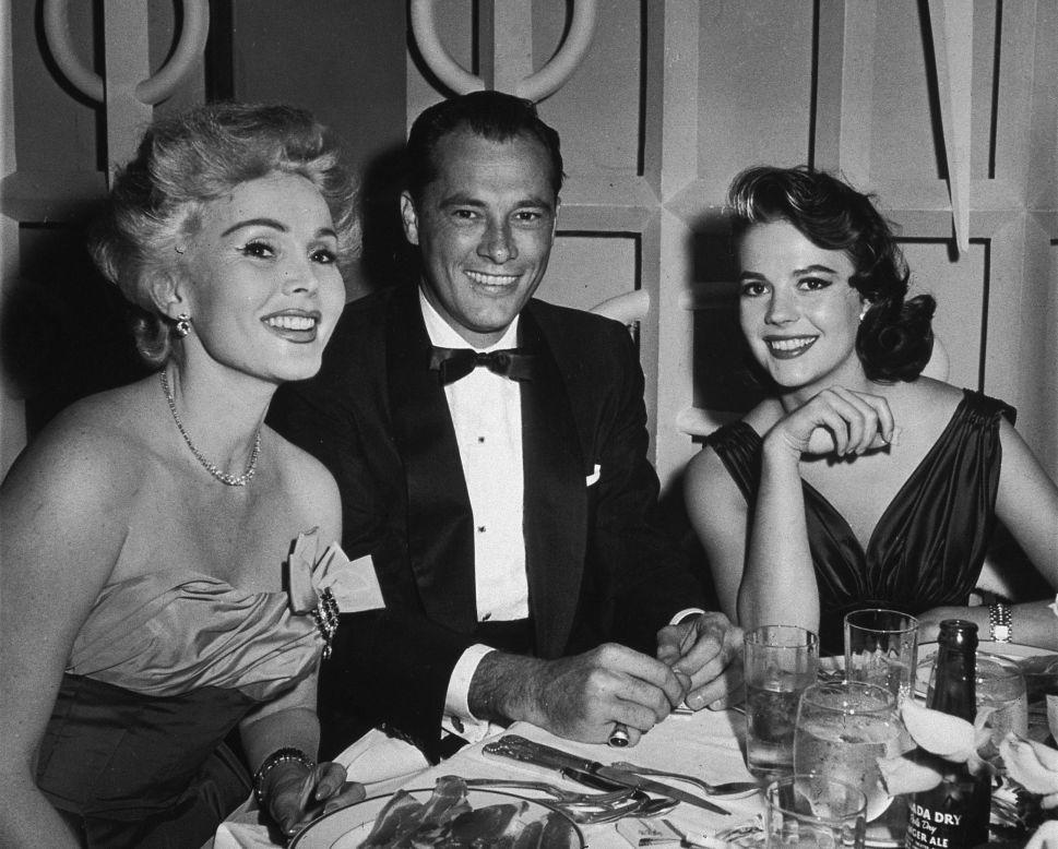 <strong>Star power:</strong> Hilton was known for inviting Hollywood stars to their hotel openings. Zsa Zsa Gabor (who would later marry Conrad Hilton) and Natalie Wood were among them.