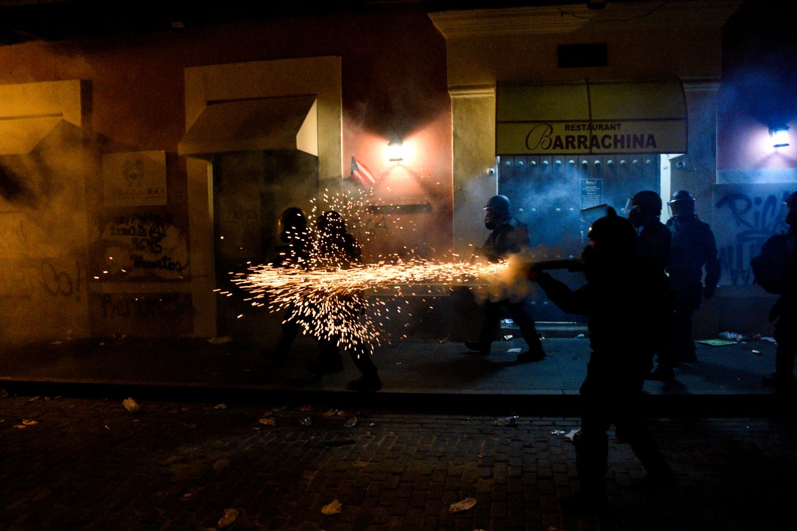 Police fire tear gas at demonstrators on July 17.