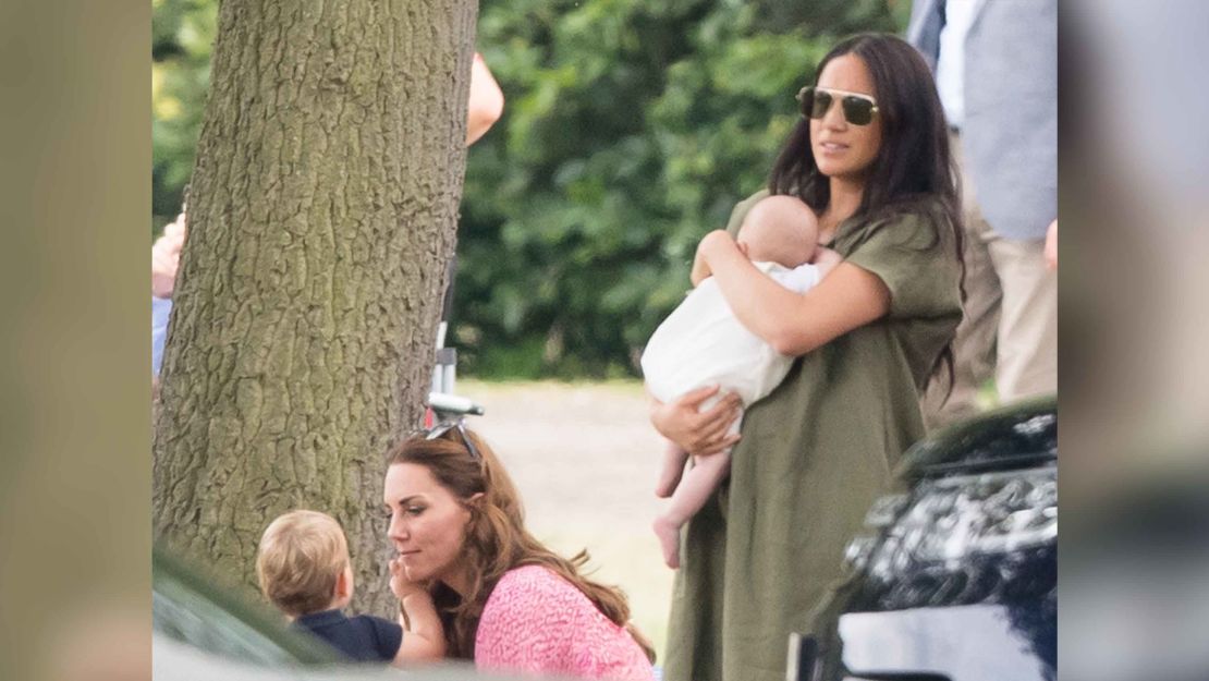Meghan holds Archie as she and Catherine attend a polo match in Wokingham last week.