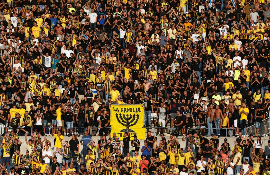 Beitar Jerusalem fans cheer on their team.