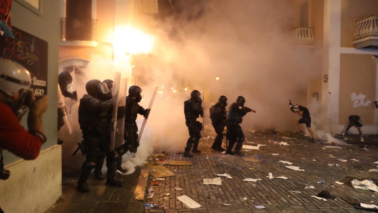 As the protests continued, demonstrators clashed once again with police in the streets of Old San Juan.