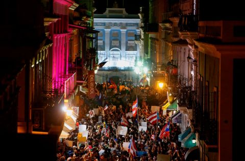 Thousands of demonstrators protest in front of the governor's mansion on July 17.