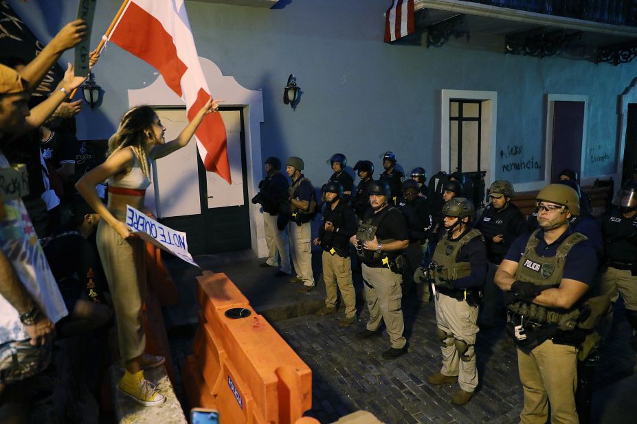 Police block the street leading to the governor's mansion on Tuesday, July 16. 