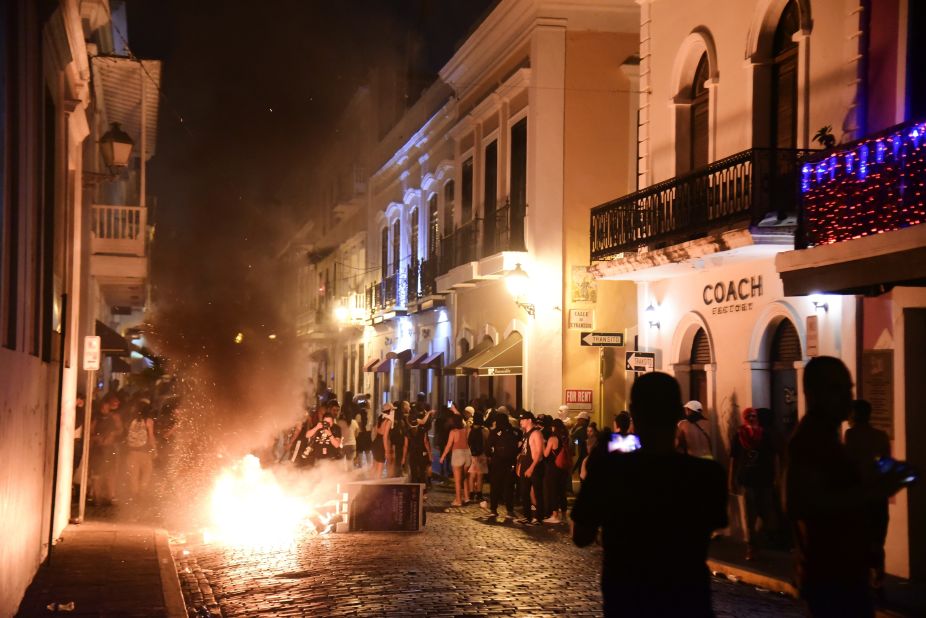 Protesters gather near the executive mansion on Monday, July 15.