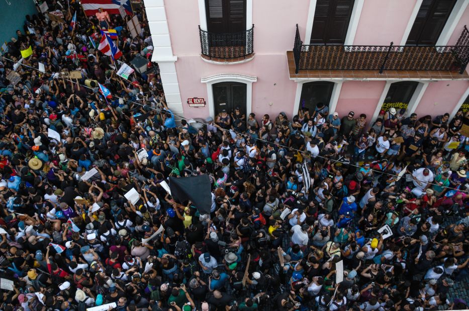 Protesters take to the streets of San Juan on July 15.