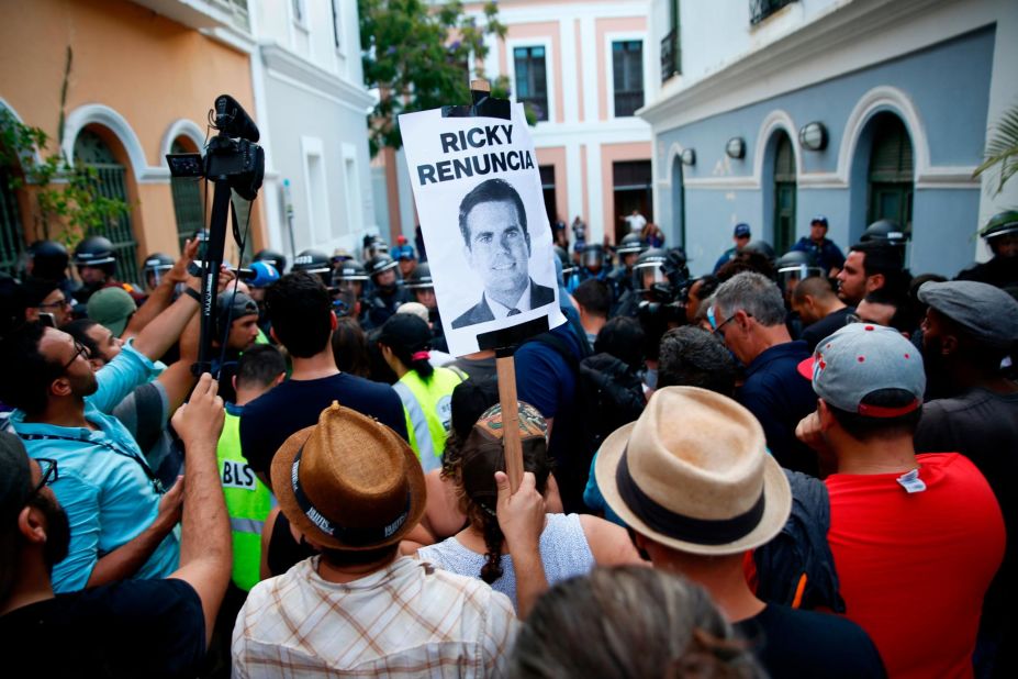 Police block the street leading to the governor's mansion on July 14.