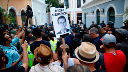OLD SAN JUAN, PUERTO RICO - JULY 14: Police block the street leading to the Governors mansion on July 14, 2019 in Old San Juan, Puerto Rico. Protesters are calling on Gov. Rossello to step down after a group chat was exposed that included misogynistic and homophobic comments. The signs reads Ricky resign. (Photo by Jose Jimenez/Getty Images)