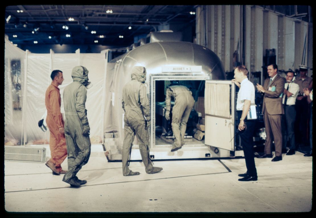 Carpentier, far left, goes into quarantine with the Apollo 11 astronauts.