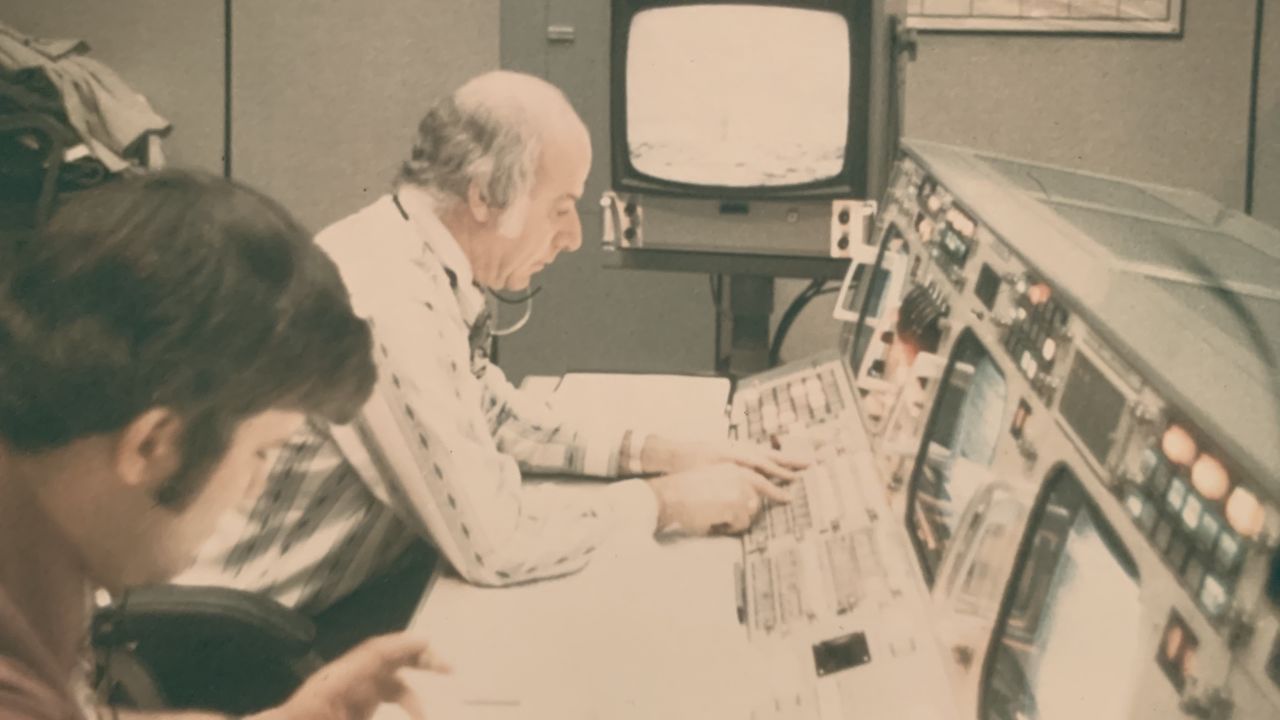 Ed Fendell sits at his console.