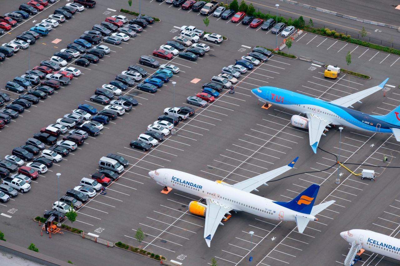 Boeing 737 MAX airplanes are stored on employee parking lots near Boeing Field, on June 27, 2019.