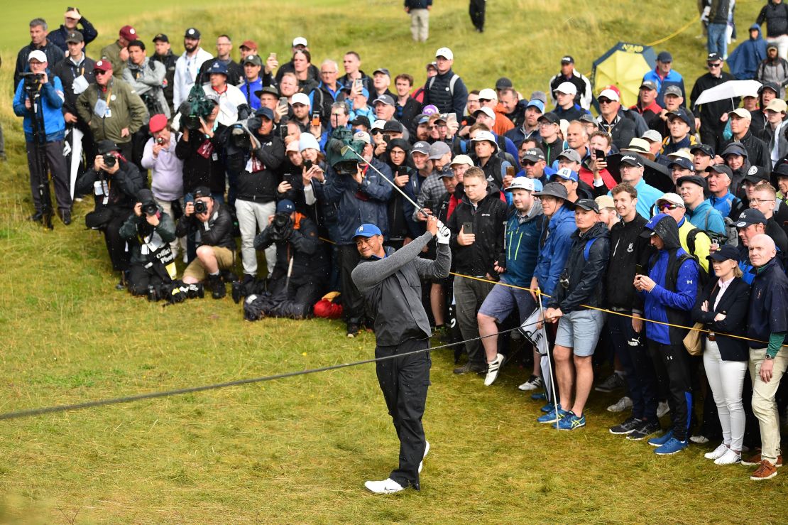 Tiger Woods tangled with the rough to the left of the long seventh. 