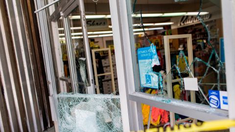 A department store's windows are broken Thursday, after protests the previous night in San Juan.
