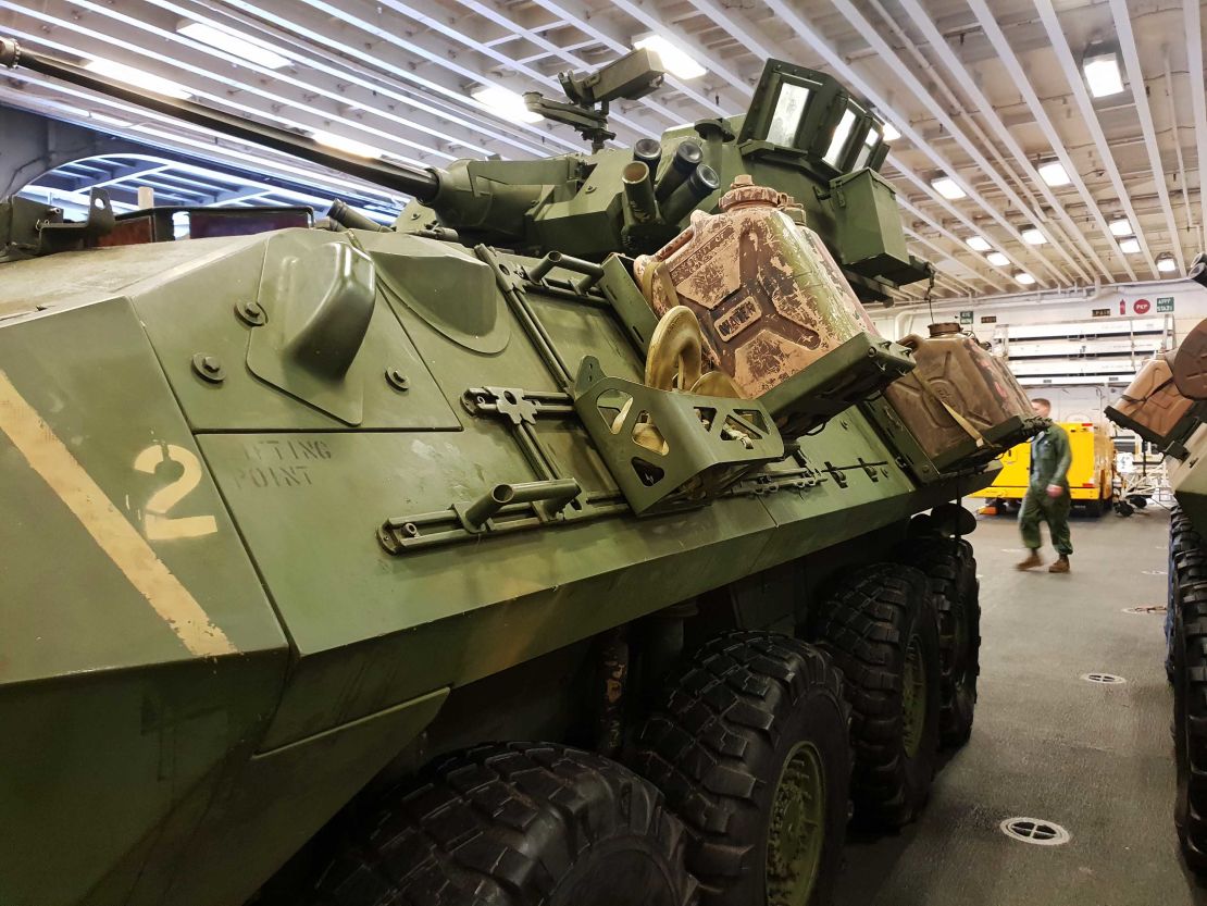 Tens of trucks, tanks, armored vehicles, hovercrafts and amphibious vehicles are stored in the belly of the ship.