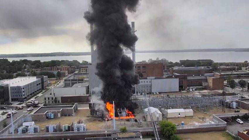 In this photo provided by WKOW-TV one of two fires as power substations burns in Madison, Wis., knocking out power to more than 11,000 customers on what is promising to be a sweltering day. (WKOW-TV via AP)