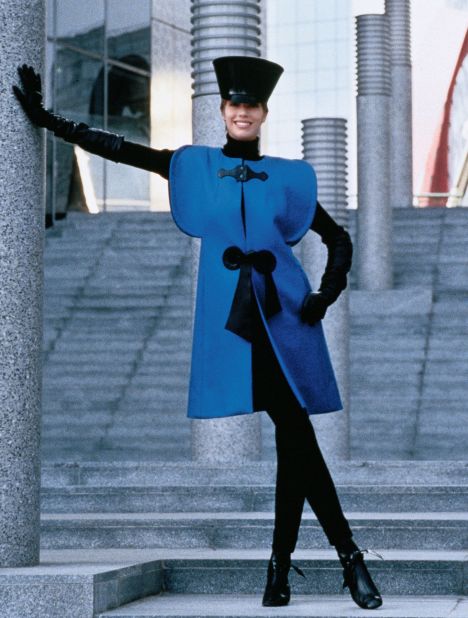 Model wearing Pierre Cardin blue wool vest with leather details, 1992. 