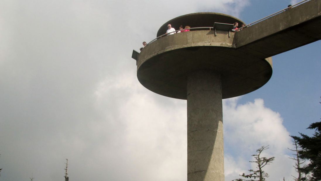 <strong>Clingmans Dome:</strong> This tower sits atop Clingmans Dome, the highest peak in the park at 6,643 feet (2,025 meters). The tower provides a spectacular 360-degree view free of obstructions. It's a steep walk of half a mile to reach it.